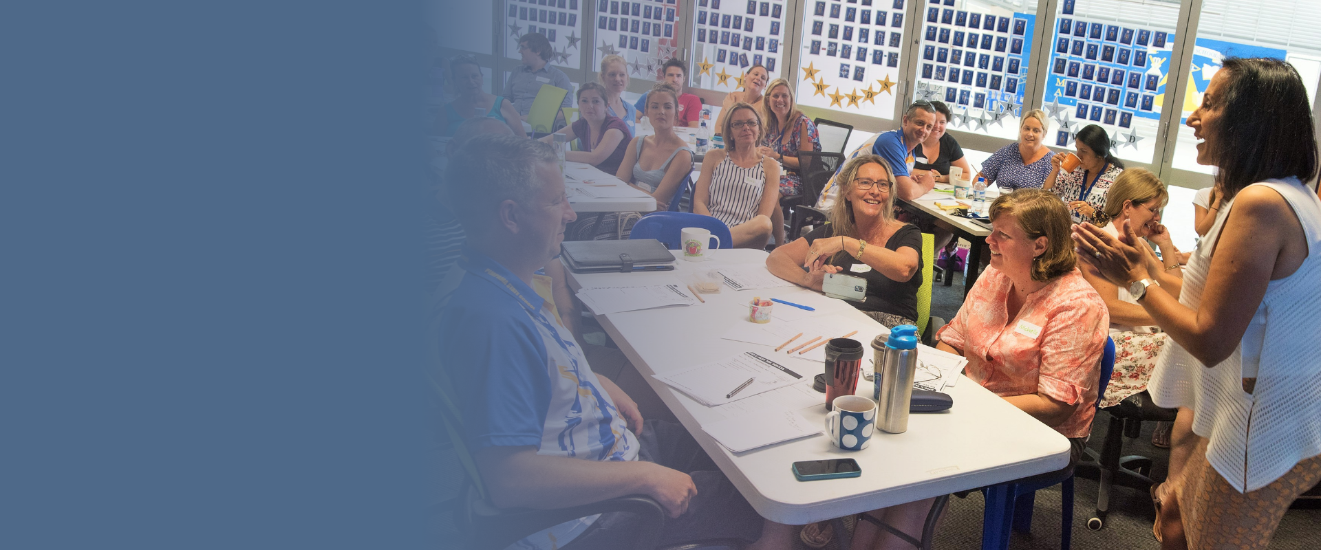A Seven Steps presenter training teachers at a school PD